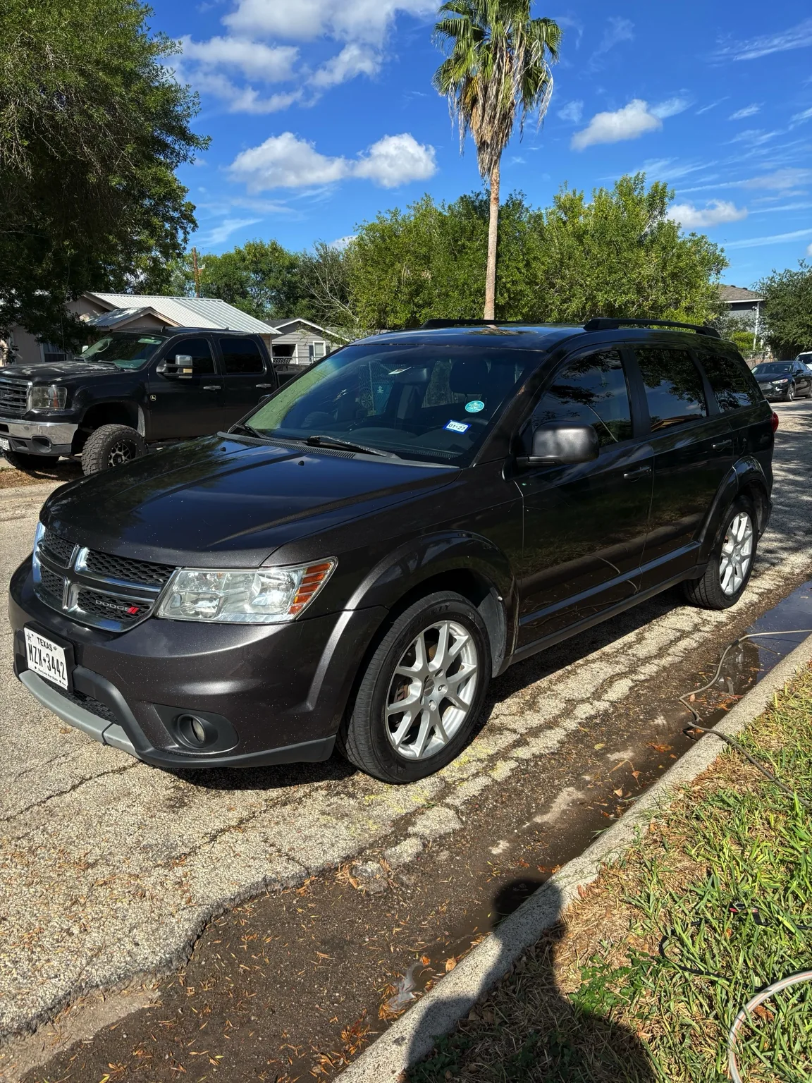 Black Dodge Journey after a Revival detail